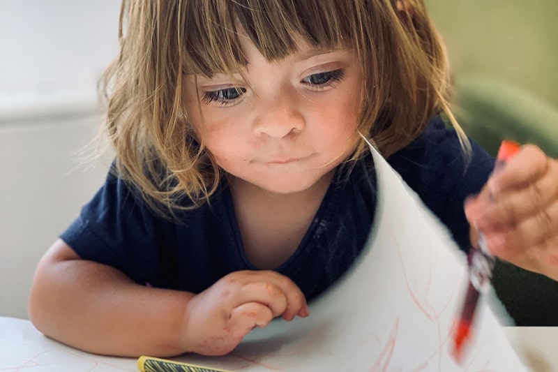 Ivy enjoying her drawing at the Springboard centre