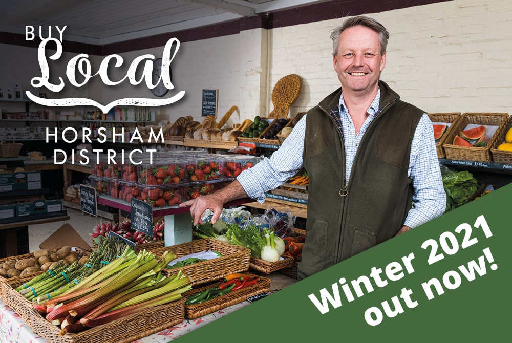 The Our District winter 2021 edition features a local businessman in his farm shop as part of the Buy Local Horsham District campaign