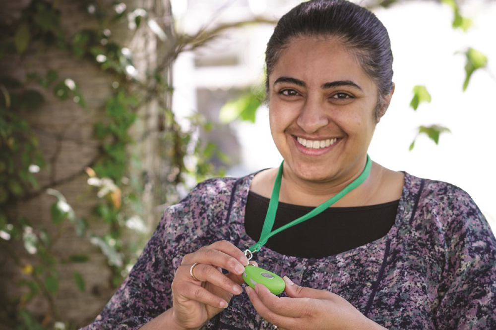 A woman with a Community Link pendant