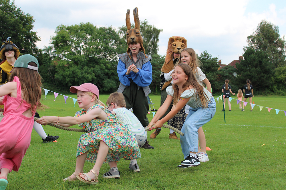 Children enjoying a tug of war